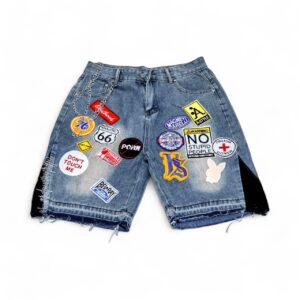 KHAOTIC PATCHWORK WORN IN DENIM SHORTS WITH WALLET CHAIN DETAIL